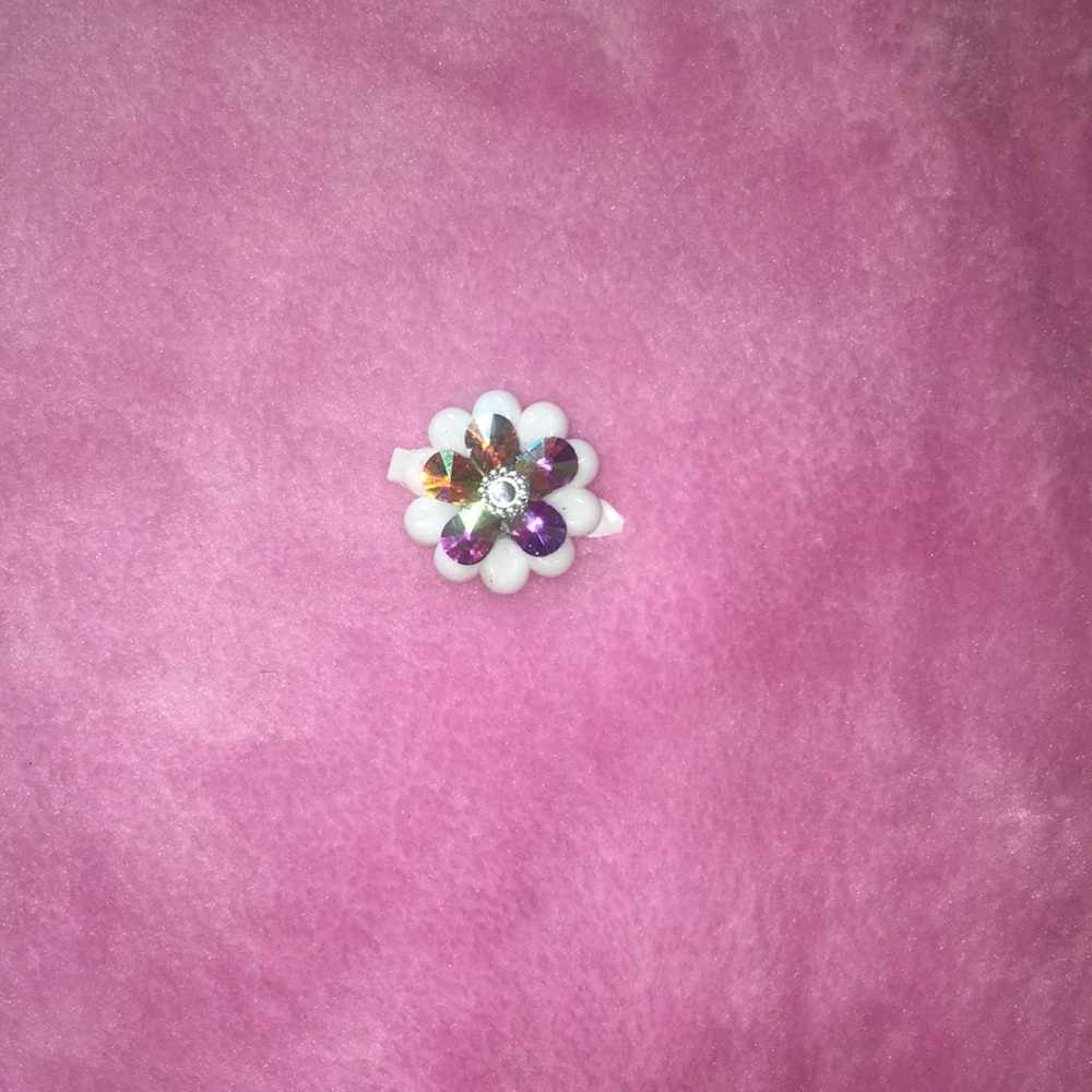 White hair accessory with gems .